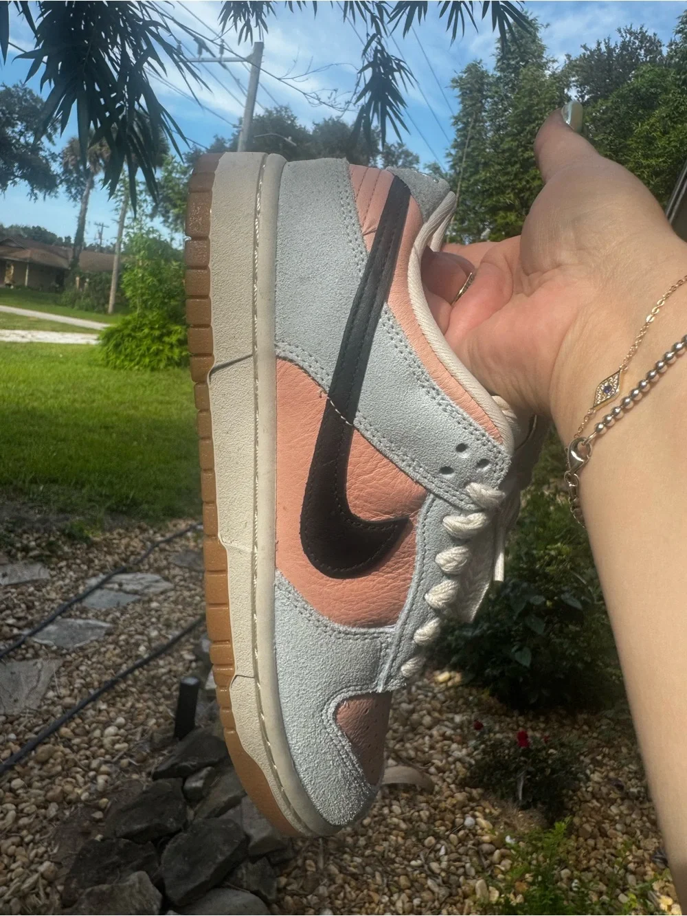 Woman’s Nike Dunk Low-Top Sneakers in Peach/blue with braided laces